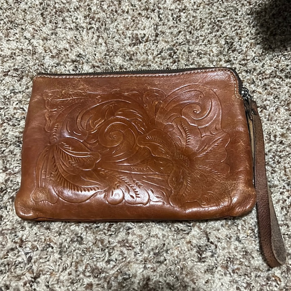 Patricia Nash Tooled Cassini Florence wristlet.  Good used condition.